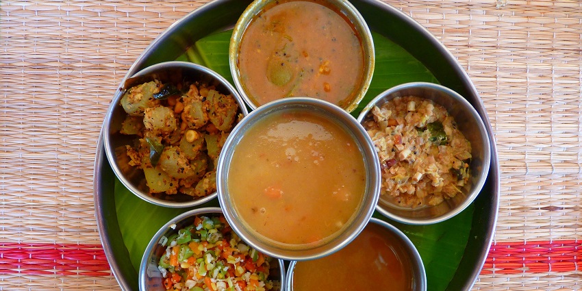 Snapshot of the mouth-watering Indian thalli having varieties of food to eat