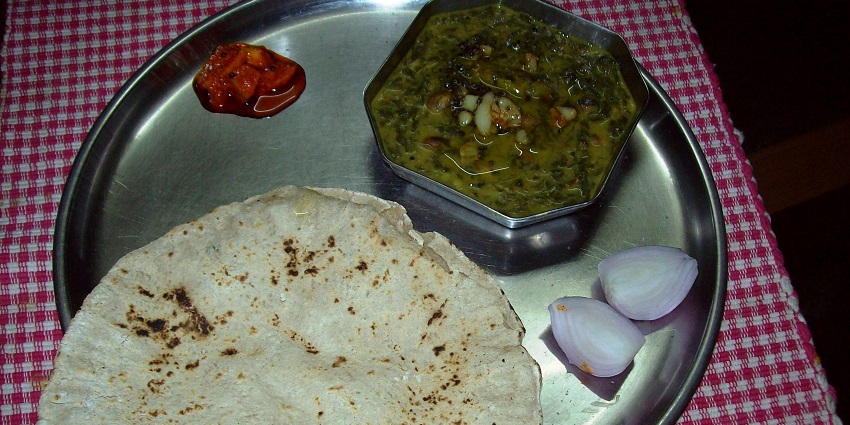 Local eateries in Parola offer authentic Maharashtrian cuisine delight in a thalli.