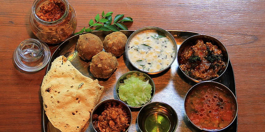 Authentic thali of Bikaner served with the local dish of dal baati chorma