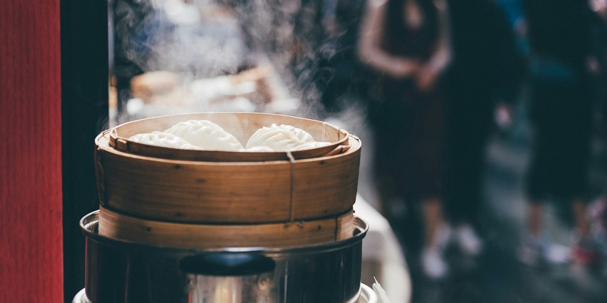 Image of dumpling in a steamer looking hot and steamy - food to try in Ladakh