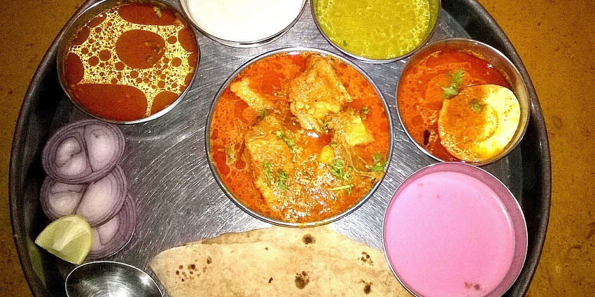 Image of a Thali - Local restaurants near Varugad Fort serve traditional Maharashtrian cuisine