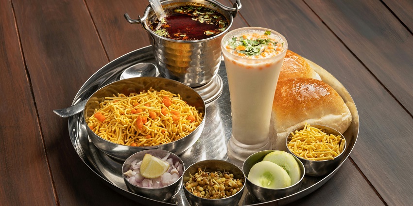 Authentic Indian thali featuring a variety of flavoursome dishes arranged beautifully.