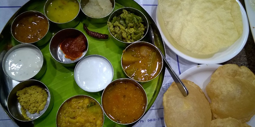 A picture of a delicious thali served at a restaurant in Tamil Nadu