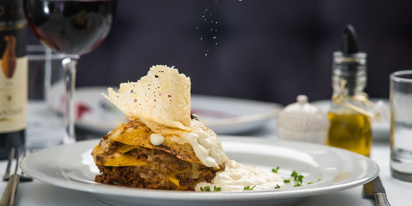 Delicious lasagna pasta meal served on a plate, showcasing layers of flavor and cheese.