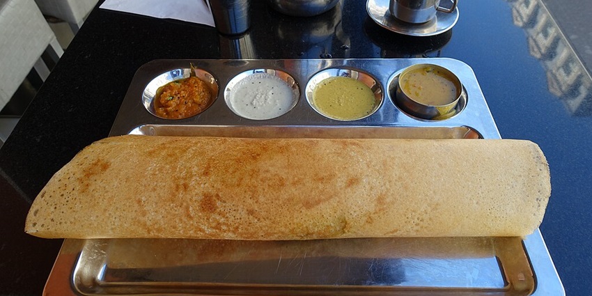 A masala dosa, an authentic dish, served at the local eatery nearby