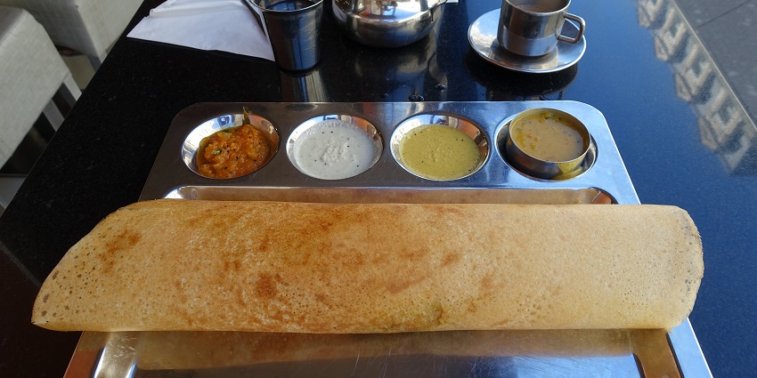 Limited food options on the Velliangiri trek; nearby eateries offer traditional meals.