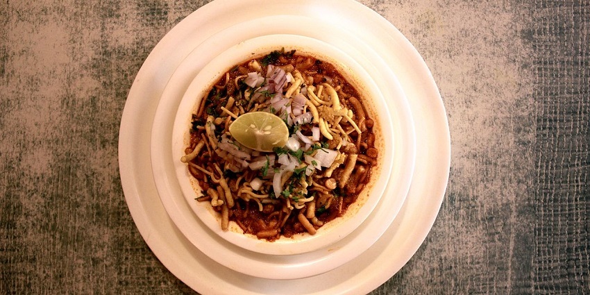A picture of a famous Maharashtrian snack, Misal Pav, served at a restaurant near the Balaknath Temple
