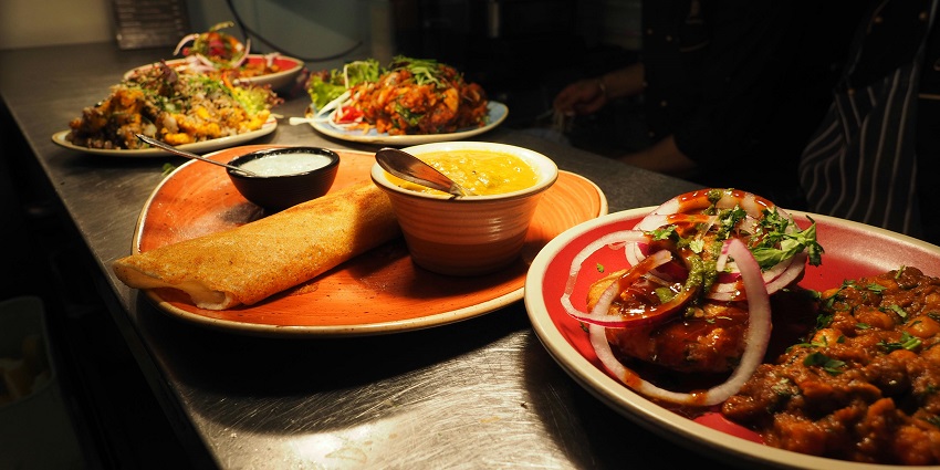 Picture of the tasty Indian food in the platter with the south India delicacy of Dosa and Chutney