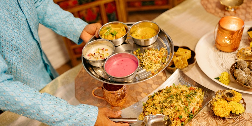 Image of Indian food served on a table - amazing eateries in and around Blue World Water Park
