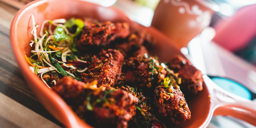 Enjoy delicious local food at eateries near Jungle Water Park, Uttar Pradesh, India.
