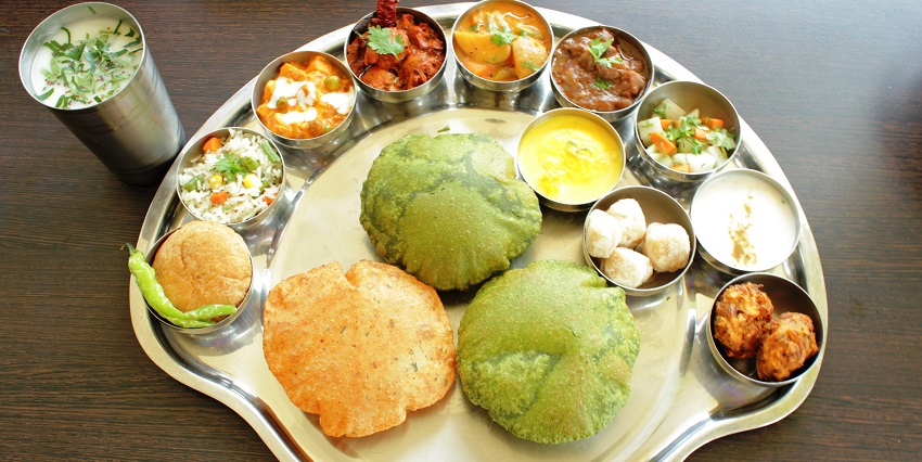 An authentic Indian thali served at a local restaurant nearby