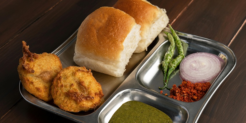 Delight in a trendy food court as this couple savors a flavorful meal together in the day.