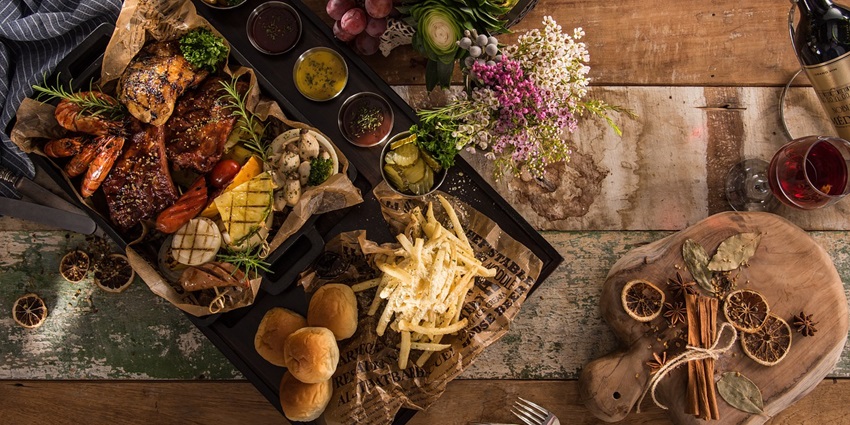 Artfully arranged platter of delicious starters showcasing a variety of appetizers.