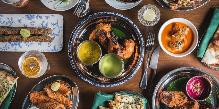 Savour delicious Punjabi cuisine like butter chicken, naan and dal makhani at the restaurants near Ludhiana Fort