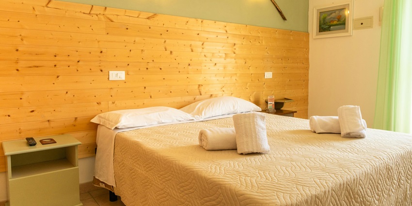 Room of a hotel in the nearby location offering a cosy, budget and comfortable stay.
