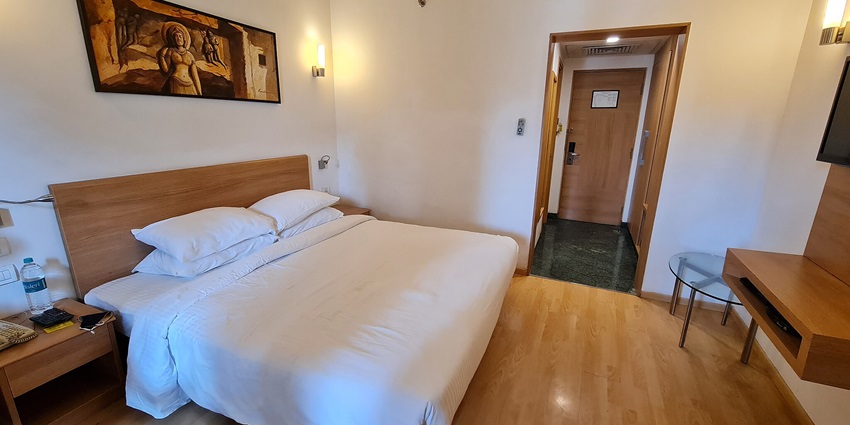 Elegant hotel room, featuring modern architecture and welcoming ambiance