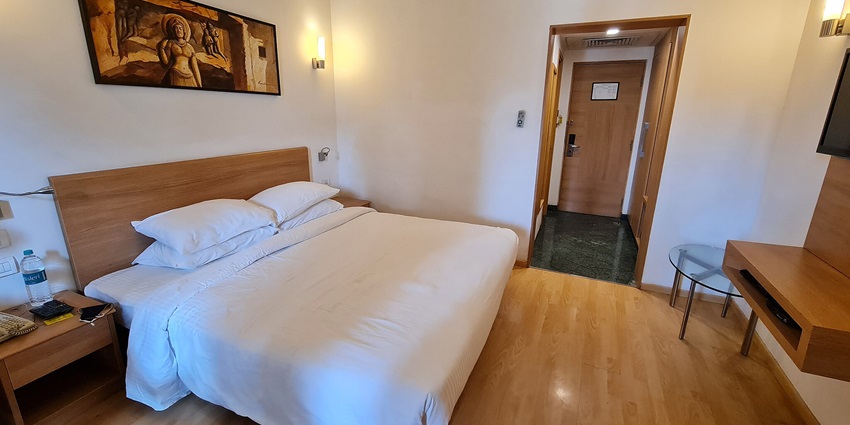 Elegant hotel room, featuring modern architecture and welcoming ambience