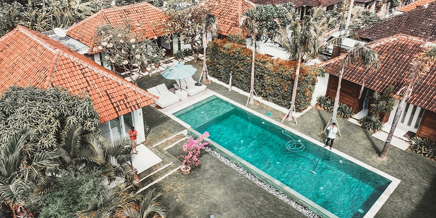 Image of a hotel in Sanur with a pool, facing the ocean near Grand Inna Bali Beach Sanur