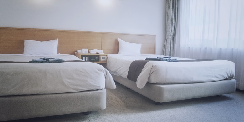 Image of a hotel room -Budget friendly hotel with clean rooms and basic amenities.