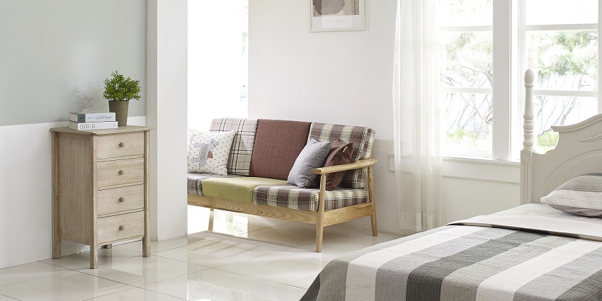 Cosy bedroom with a comfortable bed and spacious cupboard in a neatly organised layout