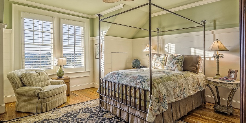 A beautifully designed bedroom interior with modern decor, a cosy bed, and stylish furniture.