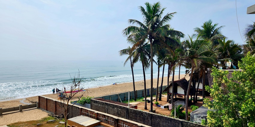 Comfortable hotel room to stay with basic amenities during a visit to Thirukadaiyur Temple.