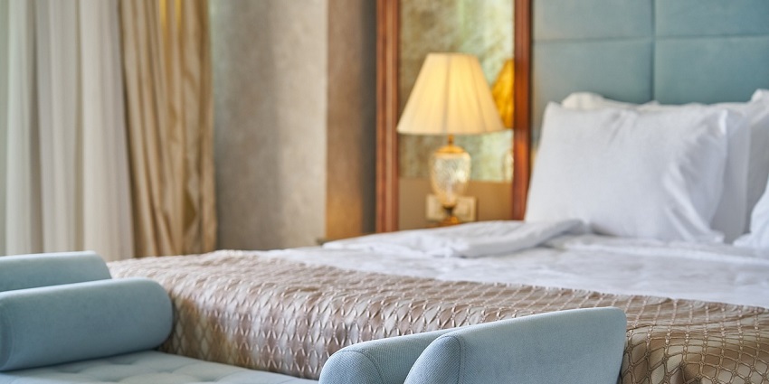 A hotel room near Srivilliputhur Temple offering a budget and comfortable stay to guests.