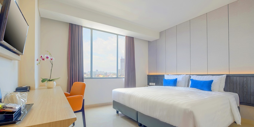 Room with a king-size bed, desk, and city view, Accommodation options near Pitalkhora Caves.