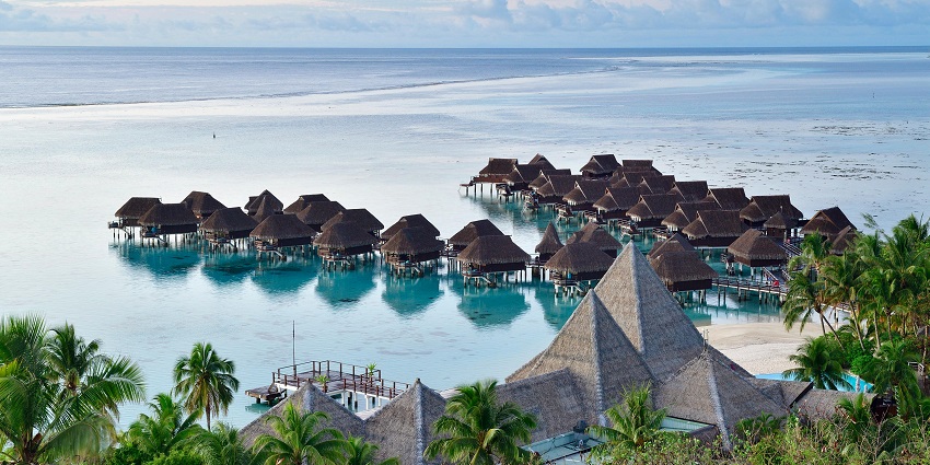 An image of a luxurious resort overlooking Melasti Beach, with stunning ocean views.