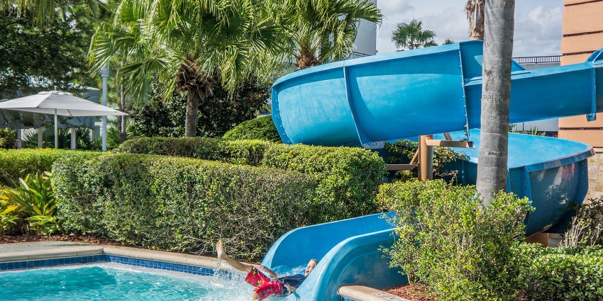 A splashy water slide at a water park, reminiscent of slides in water parks in Kathmandu.