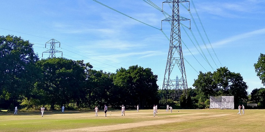 View of Willingdon Sports Club with well-kept grounds and active sports enthusiasts.