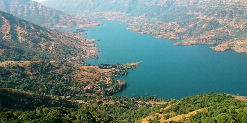 A beautiful view from Wilson Point in Maharashtra with a lake and mountains in the background