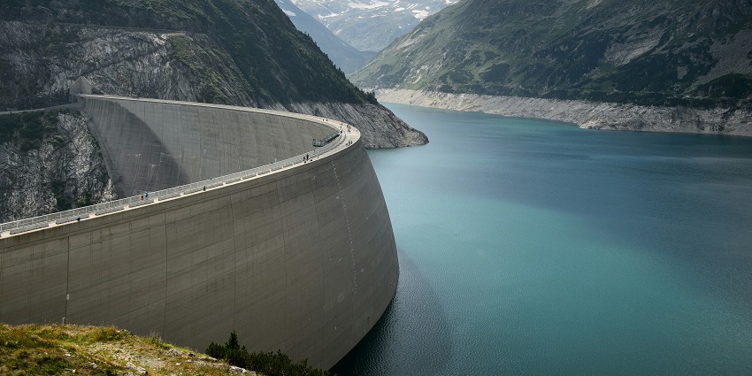 Basava Sagar Dam features a vast water body surrounded by picturesque landscapes.