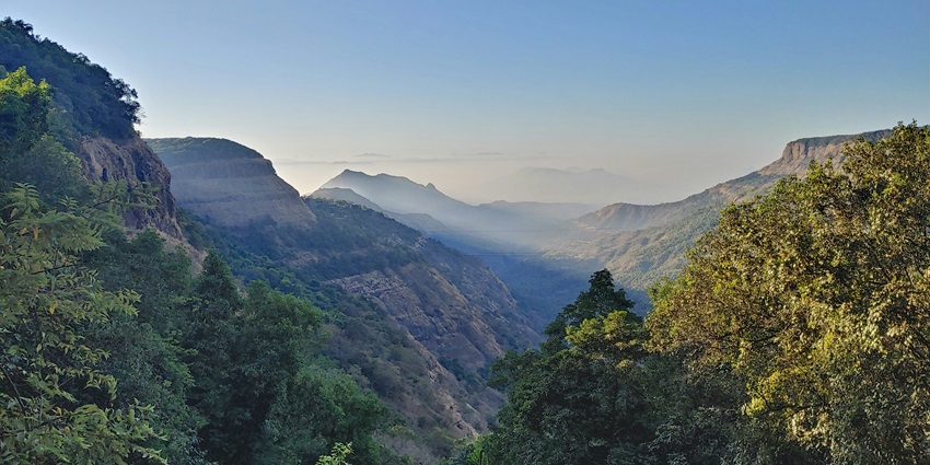 A breathtaking vista of Matheran, showcasing its majestic hills and lush greenery.