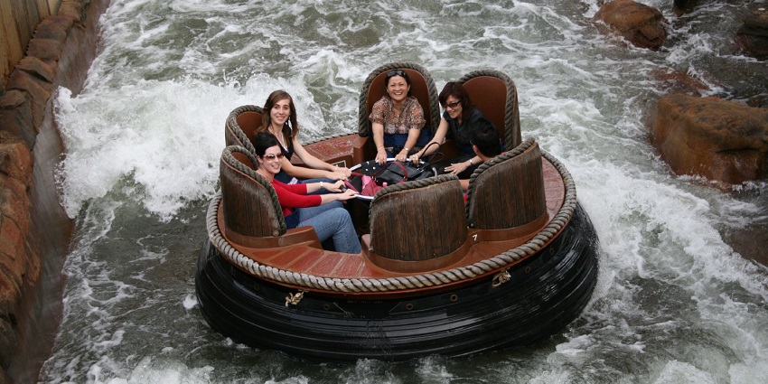 A view of four people riding on vibrant slides for a perfect day out in Madhya Pradesh