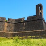 Worli Fort Mumbai with its historic stone walls overlooking the Arabian Sea under a cloudy sky