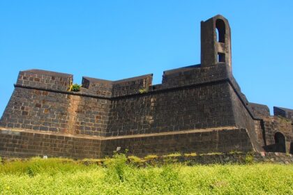 Worli Fort Mumbai with its historic stone walls overlooking the Arabian Sea under a cloudy sky