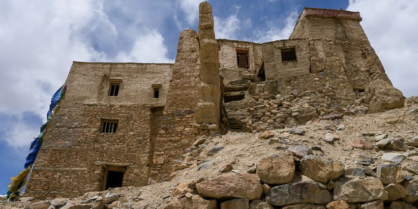 View of the zangla monastery against the clear blue sky in the background