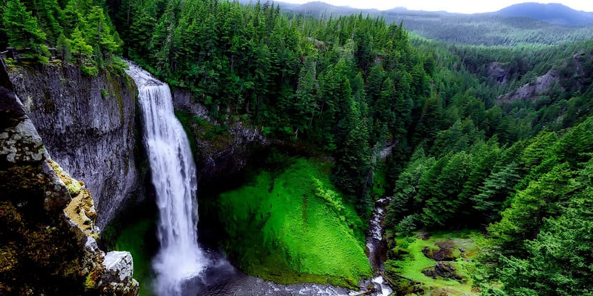 An image showing the breathtaking landscape of cascading Zenith Waterfalls.