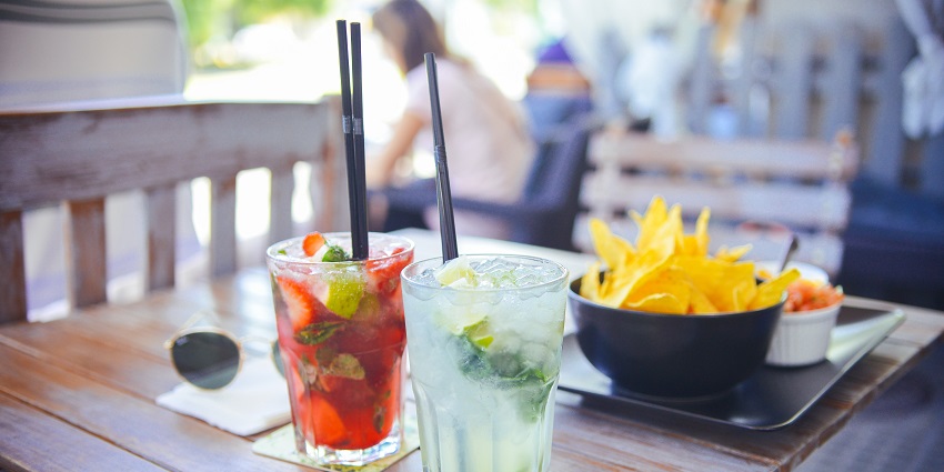 Modern lounge serving refreshing drinks and tasty bites.