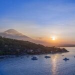 A serene image of Amed Beach showcasing its beauty and the best time to visit Amed Beach.