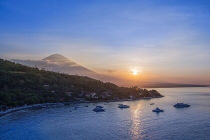 A serene image of Amed Beach showcasing its beauty and the best time to visit Amed Beach.