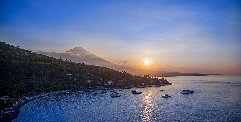 A serene image of Amed Beach showcasing its beauty and the best time to visit Amed Beach.