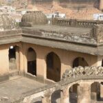 Intricate and elevated entrance to a historic Haveli with Shekhawati architecture.