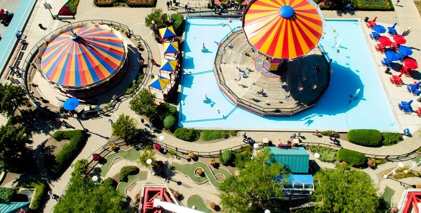 A view of one of the Badlapur water parks, showcasing thrilling rides and greenery.