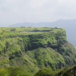 Image of lush greenery hill - Lonavala offers breathtaking views, lush hills, and tranquil waterfalls