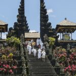 A picture of Besakih Temple , the majestic architecture against the lush green hills of Bali