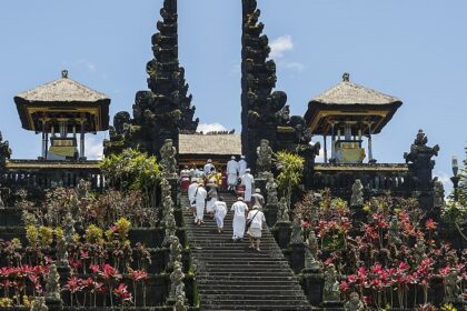 A picture of Besakih Temple , the majestic architecture against the lush green hills of Bali