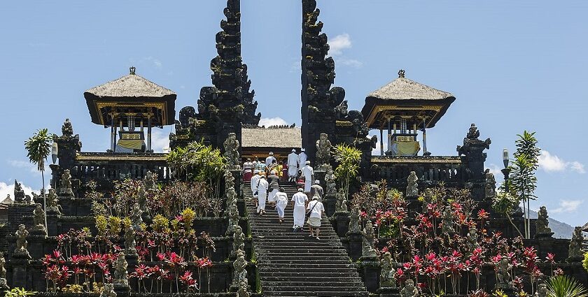 A picture of Besakih Temple , the majestic architecture against the lush green hills of Bali