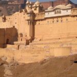 A distant view of Khandar fort with thick walls situated on the edge of a hill.